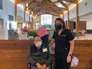 Lisa Gildea and Florentino in a WelbeHealth center